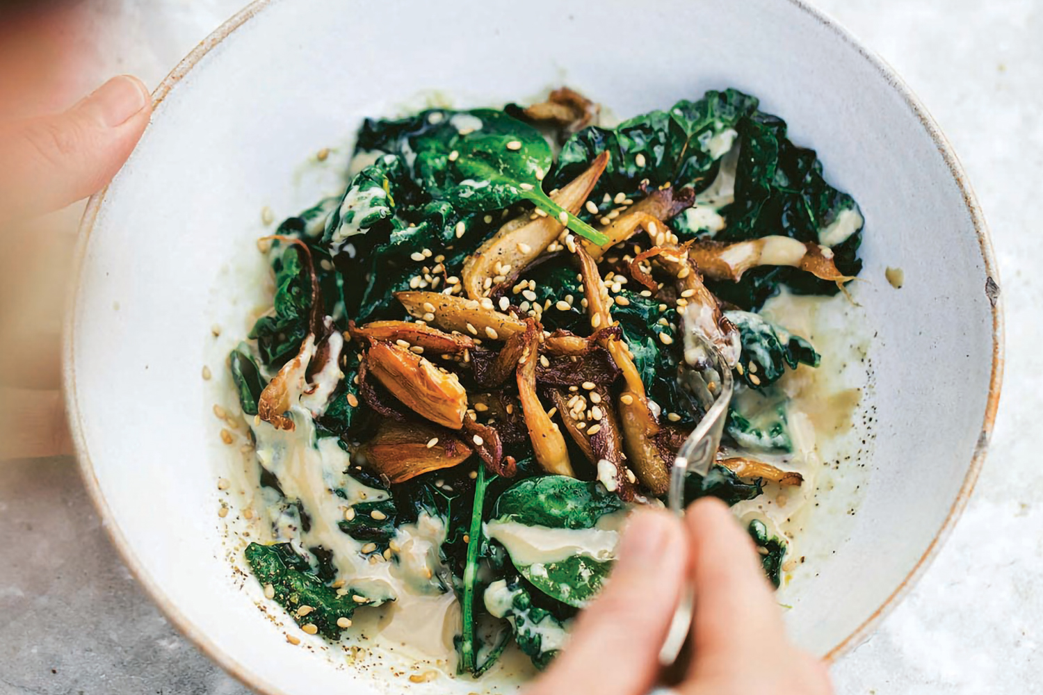 a bowl of charred kale topped with