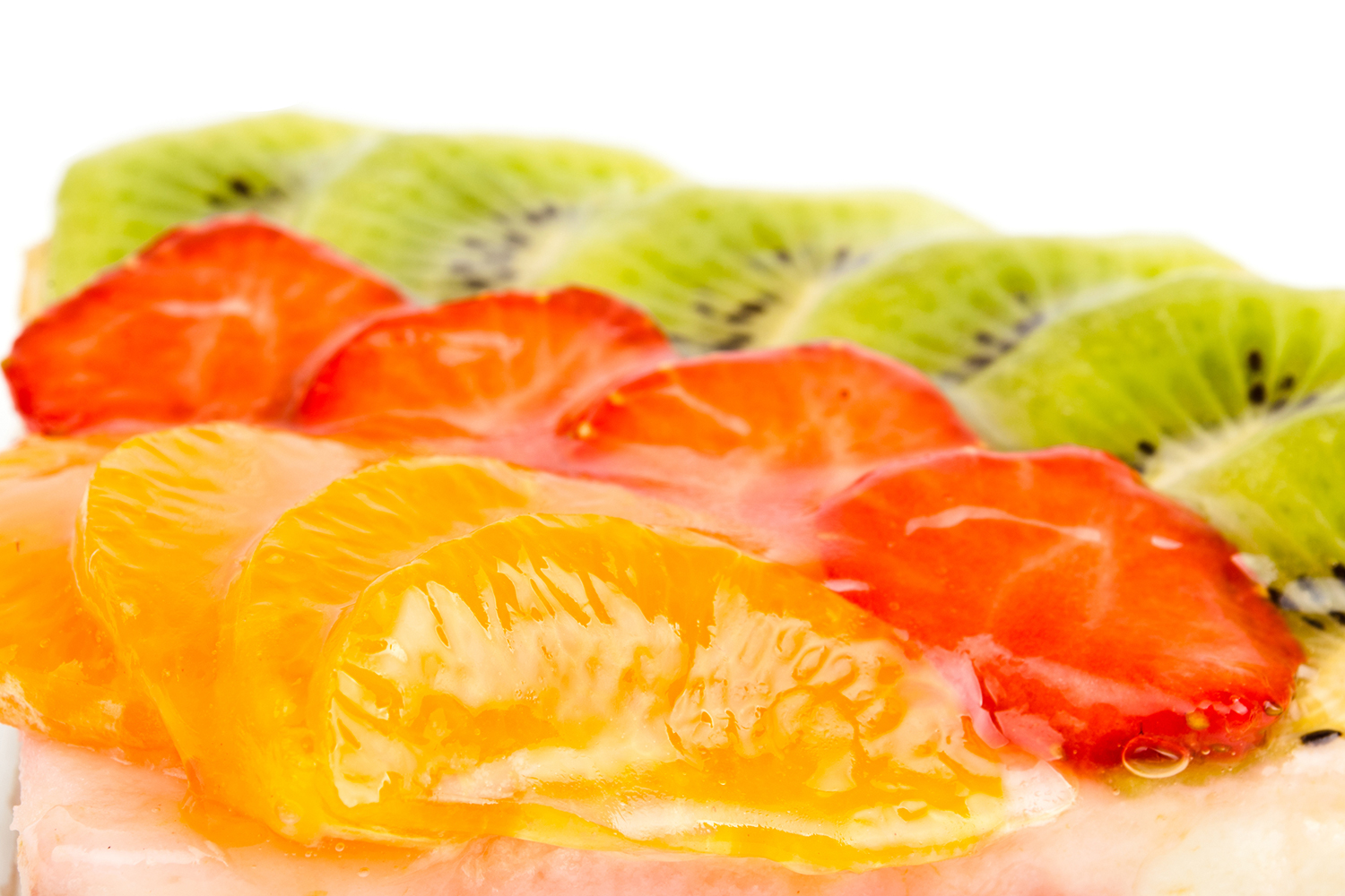 slices of orange, strawberry, and kiwi