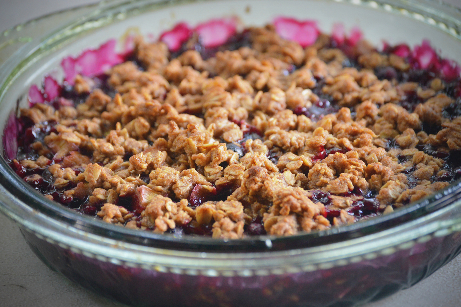 a dish of freshly baked blueberry crisp