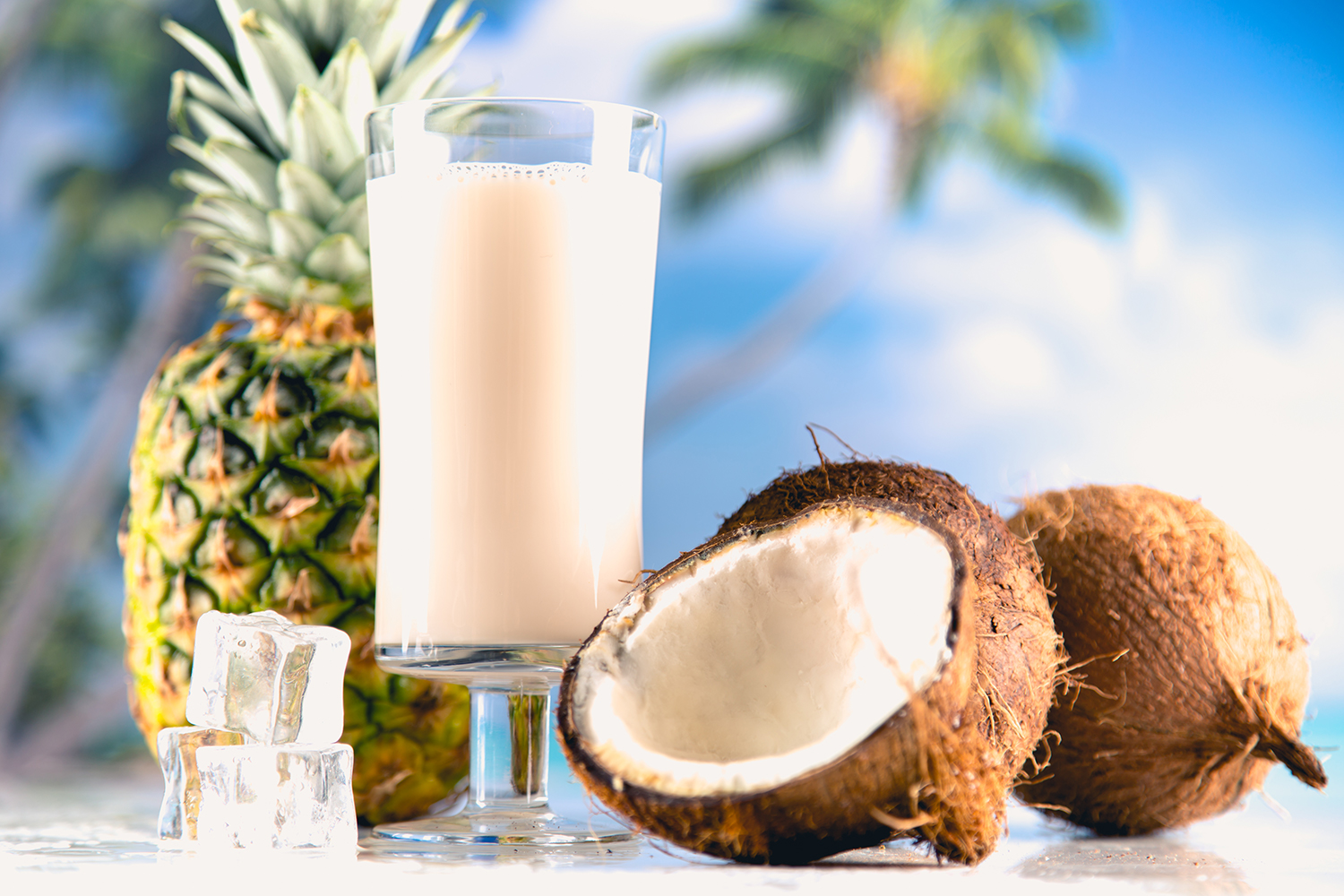 A cold glass of pineapple coconut smoothie