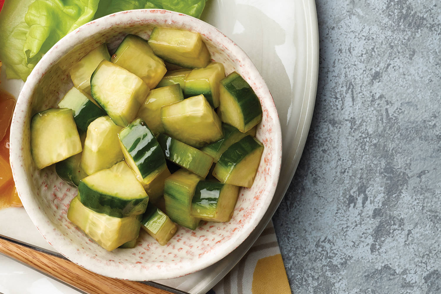 Top view of Cucumber Vinegar Salad in a white bowl.