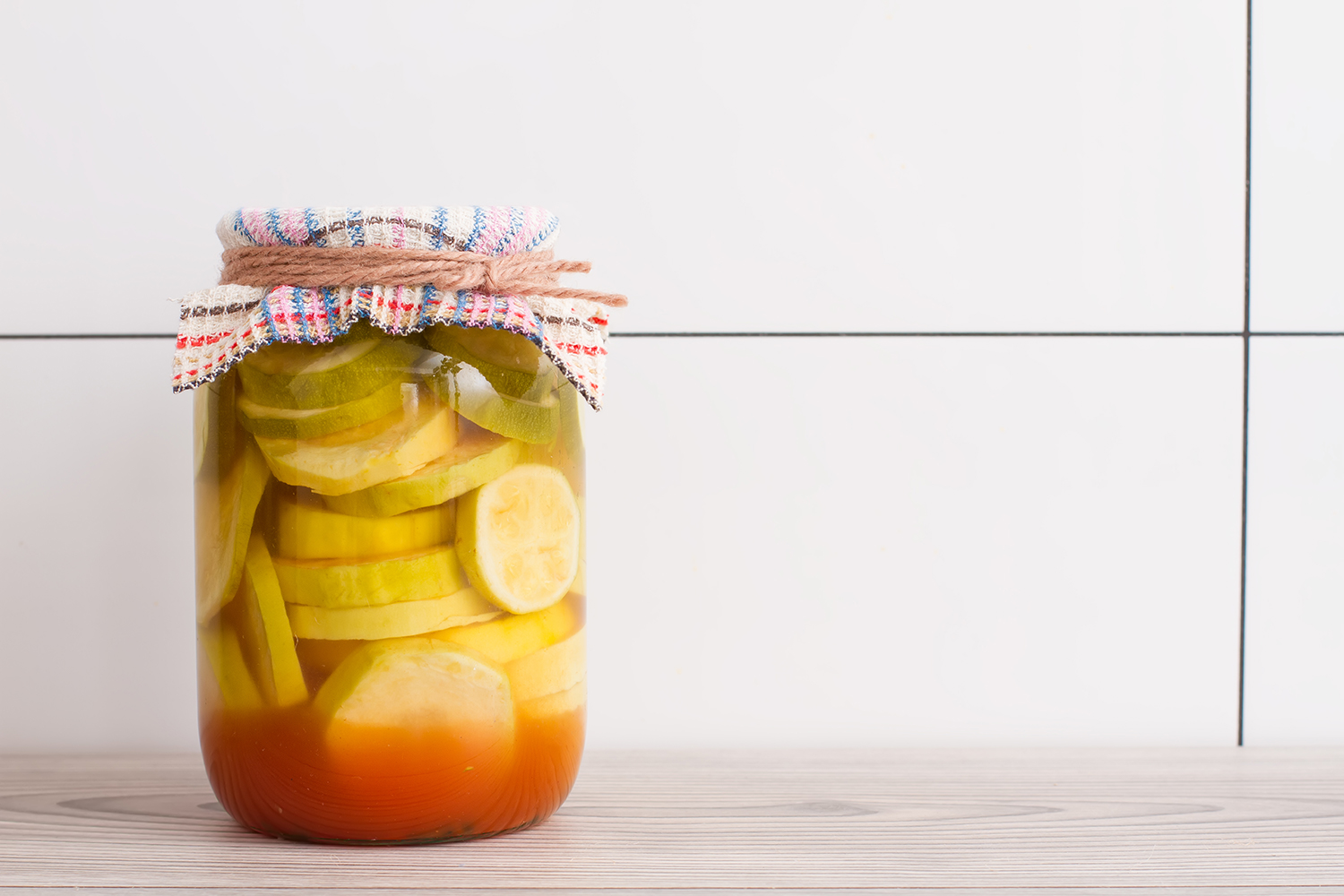 A jar of pickled summer squash