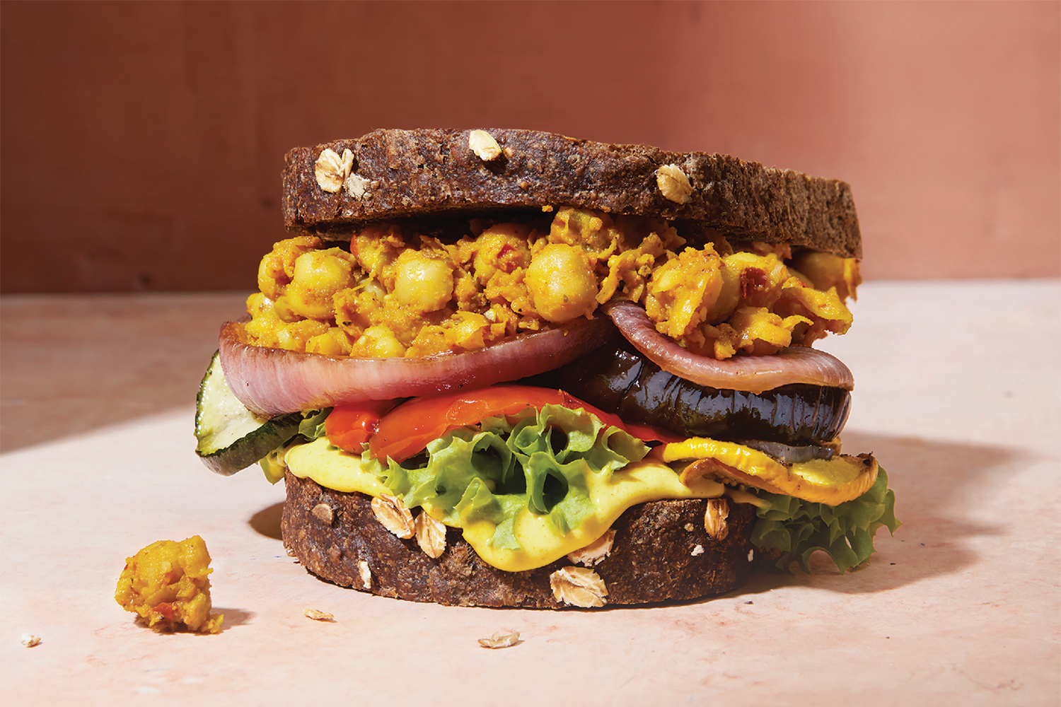 a totally stacked vegetable sandwich