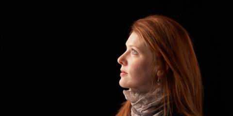 a middle-aged woman with red hair