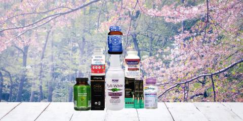 a collection of all-natural immunity supplements, body care products, and a bar of chocolate