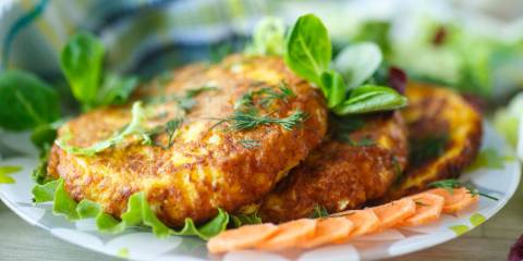 salmon fritters on a bed of lettuce