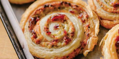 A pinwheel pastry on a baking sheet