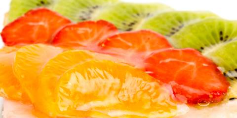 slices of orange, strawberry, and kiwi