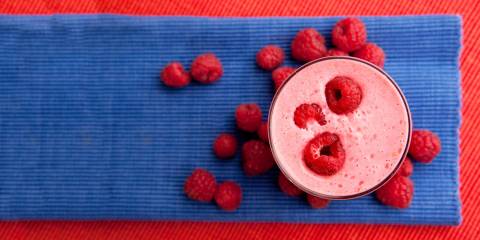 Fresh rasberries and fruit smoothie