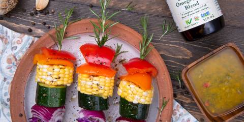 grilled veggies skewered on rosemary springs
