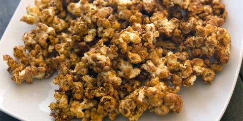 popcorn and nuts coated in caramel