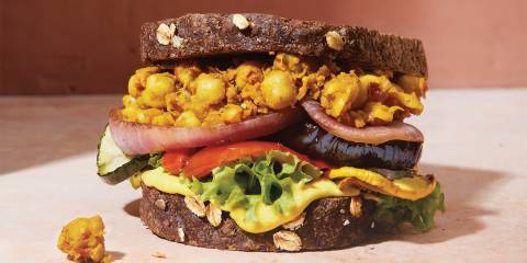 a totally stacked vegetable sandwich