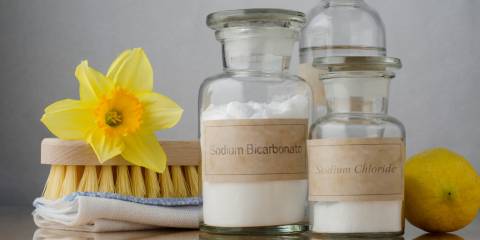 Ingredients to make vatural cleaners in eco-friendly containers