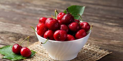 a bowl of fresh cherries